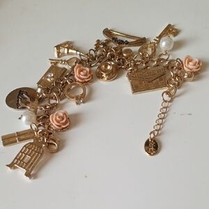 Charming Gold and Pink Charm Bracelet
